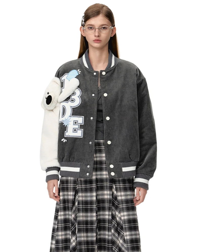 a girl wearing glasses and a jacket