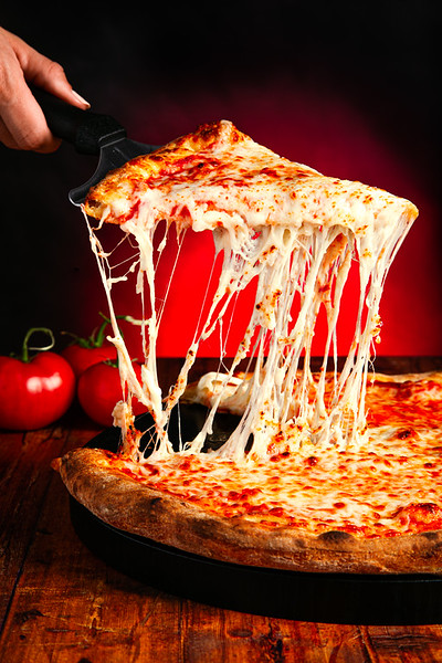 Bacio Melted Cheese Pizza with Red Studio Backdrop Advertisement by Denver Food Photographer Jason Sinn L